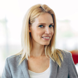 professional salesperson in car dealership